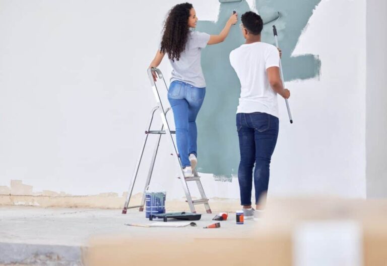 imgi_37_shot-of-a-young-couple-painting-a-wall-in-a-room-together-1024x702